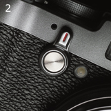 FUJIFILM X100T : 2. La palanca de cambio del visor óptico / electrónico se puede accionar mientras se mira a través del visor.